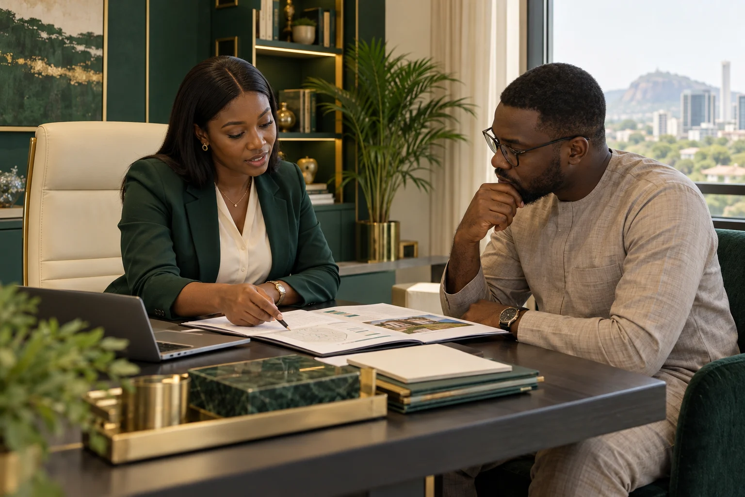 A property adviser listening to a buyer and reviewing their plans